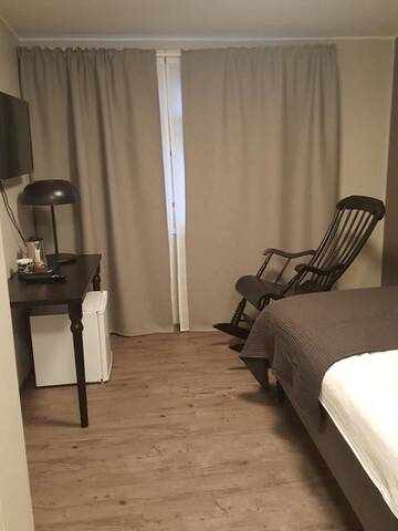 Фото номера Одноместный номер с ванной комнатой Отель Koto Hotel Pihtipudas г. Пихтипудас 8